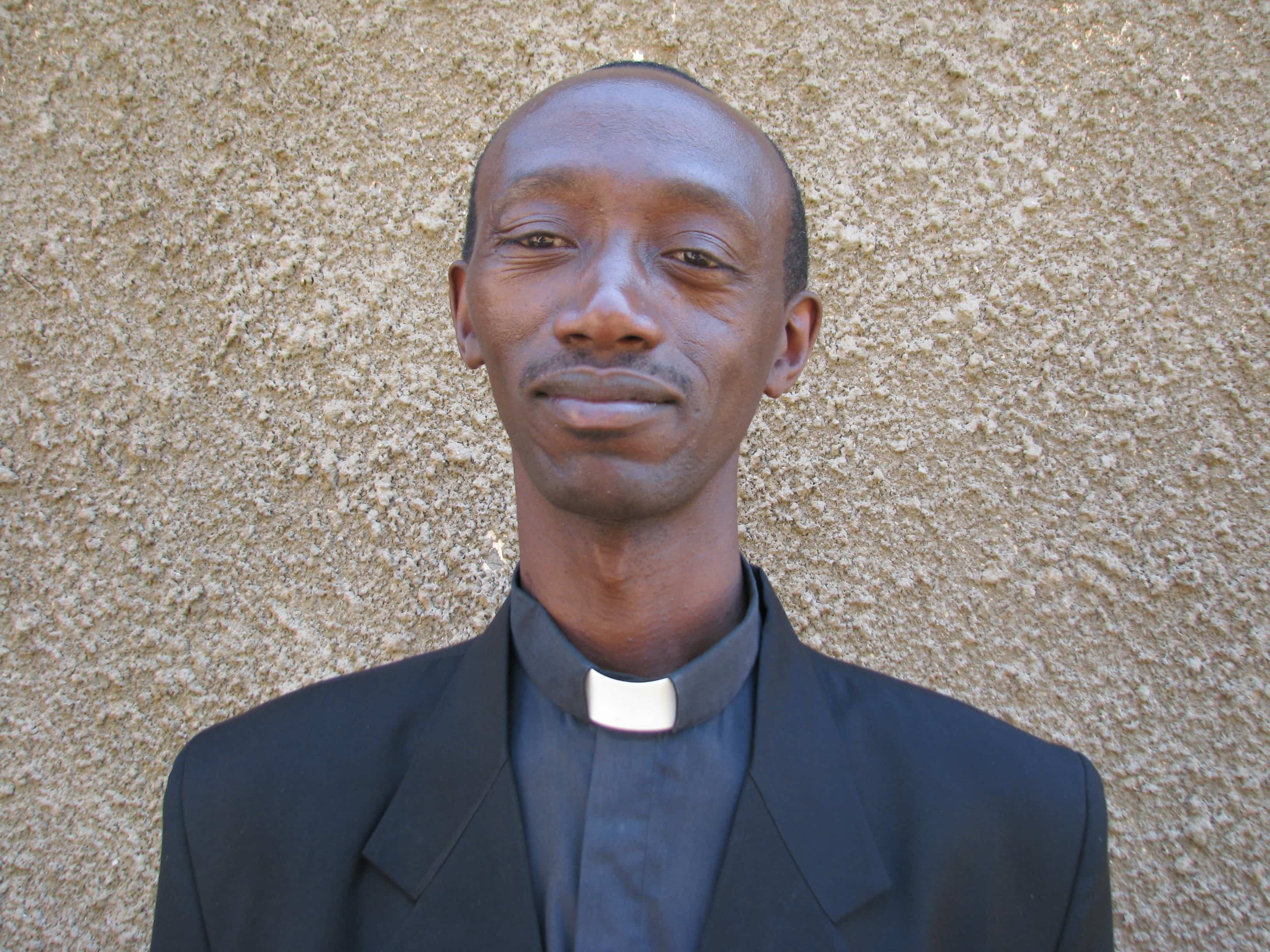 Fr. George William  Tumusiime